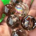 Small Smoky Quartz Spheres With Rainbow