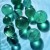 green fluorite crystal spheres with rainbow