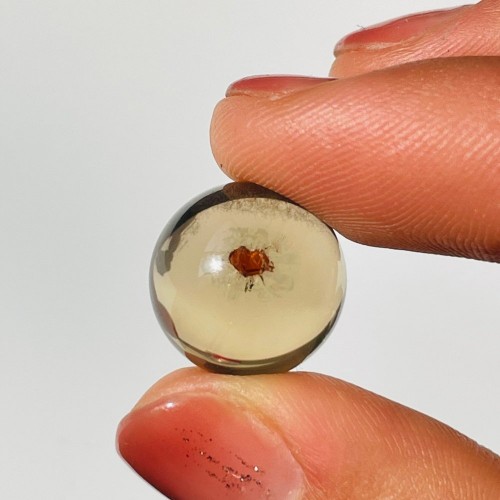 Rare Clear Quartz Sphere With Garnet Heart