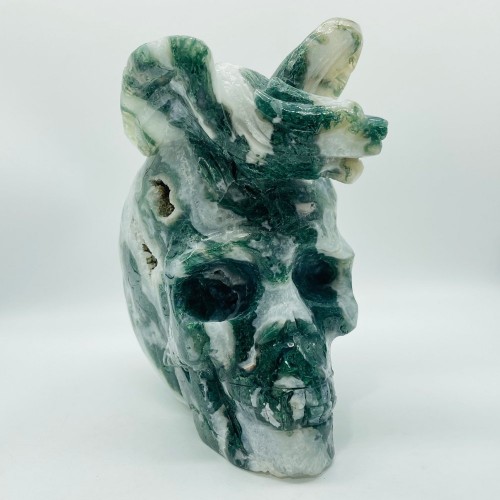 Large Moss Agate Flying Dragon Standing On Skull Carving